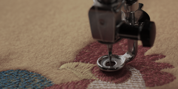 Fabrics, buttons, embroidery, and dyeing options at Nippon Thread Works Japan factory for apparel manufacturing.